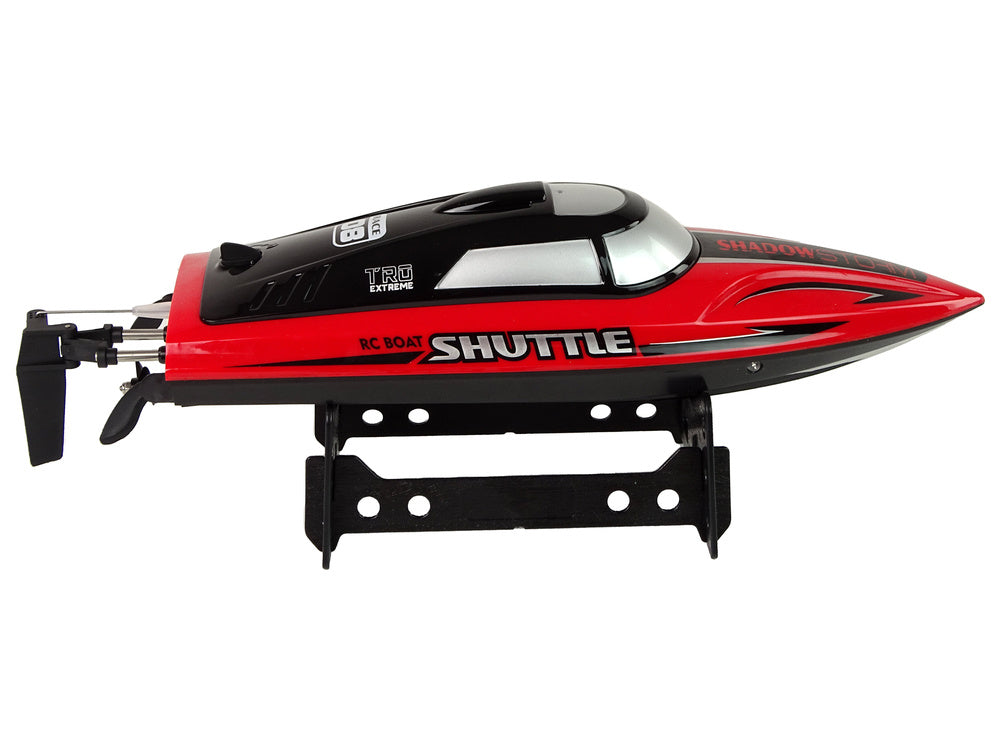 Nuotoliniu būdu valdoma motorinė valtis, raudonas