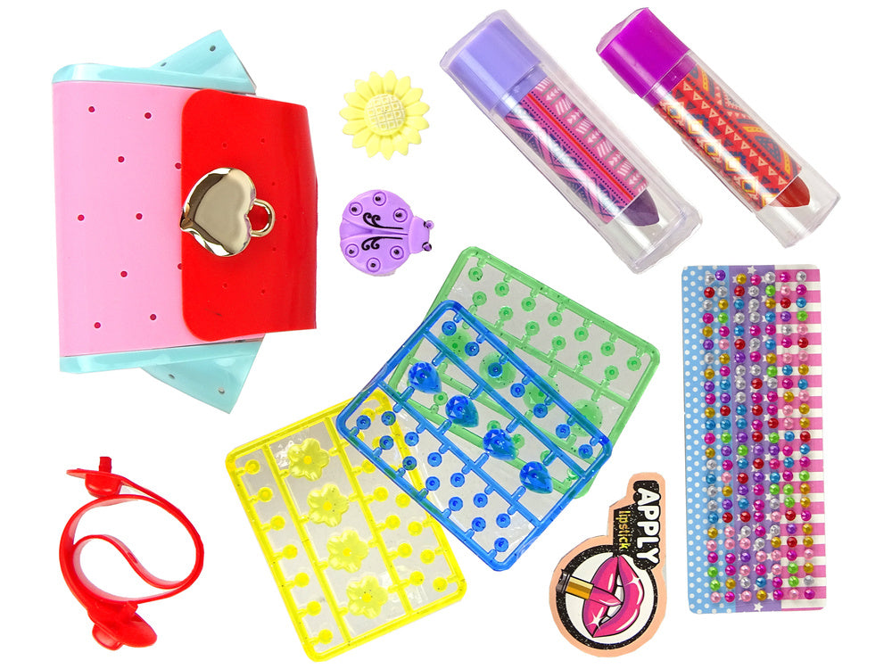 Spalvingas makiažo ir papuošalų rinkinys