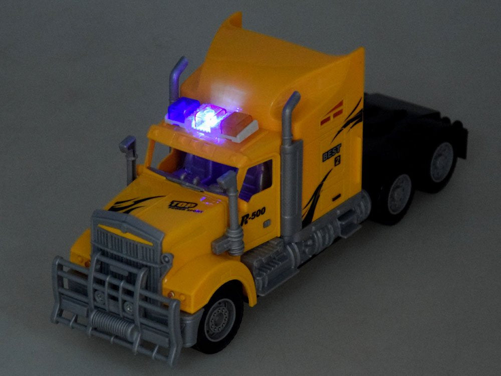 Nuotoliniu būdu valdomas vilkikas su priekaba ir traktoriumi