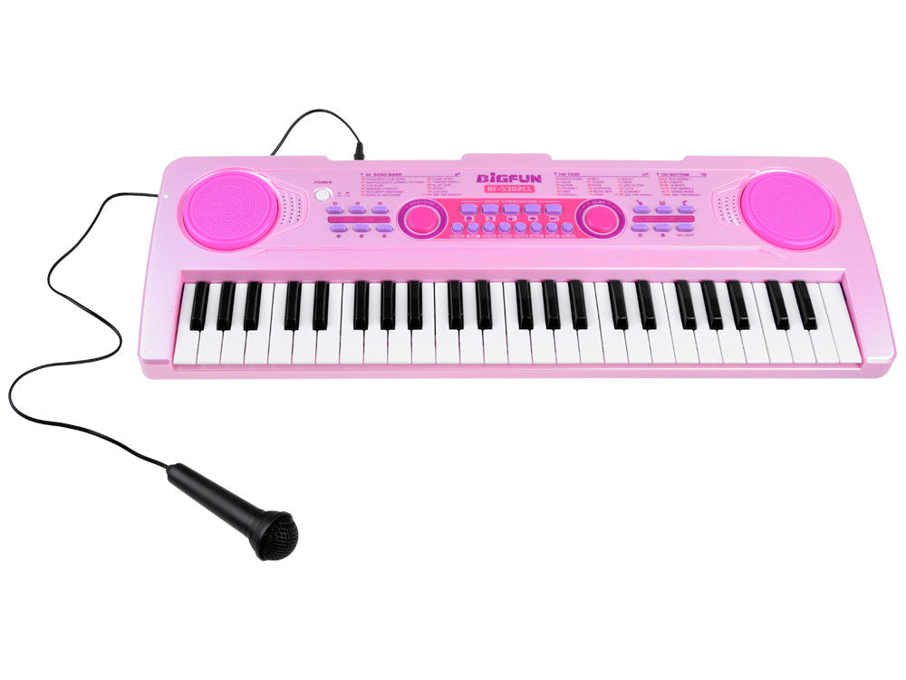 Elektrinis pianinas su mikrofonu ir šviečiančiais klavišais, rožinis