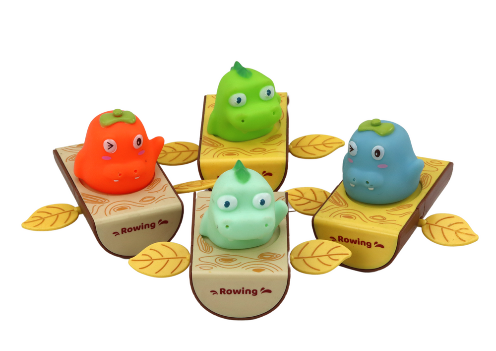 Prisukamas vonios žaislas dinozaurų valtyje