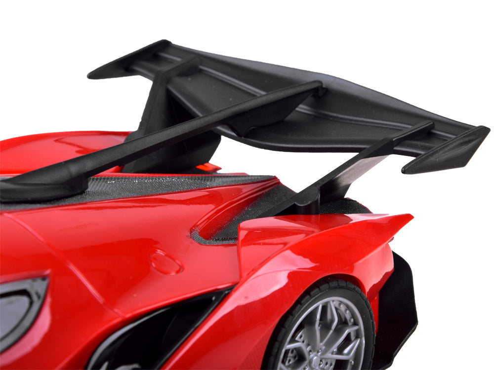 Nuotoliniu būdu valdomas sportinis automobilis su priedais, raudonas
