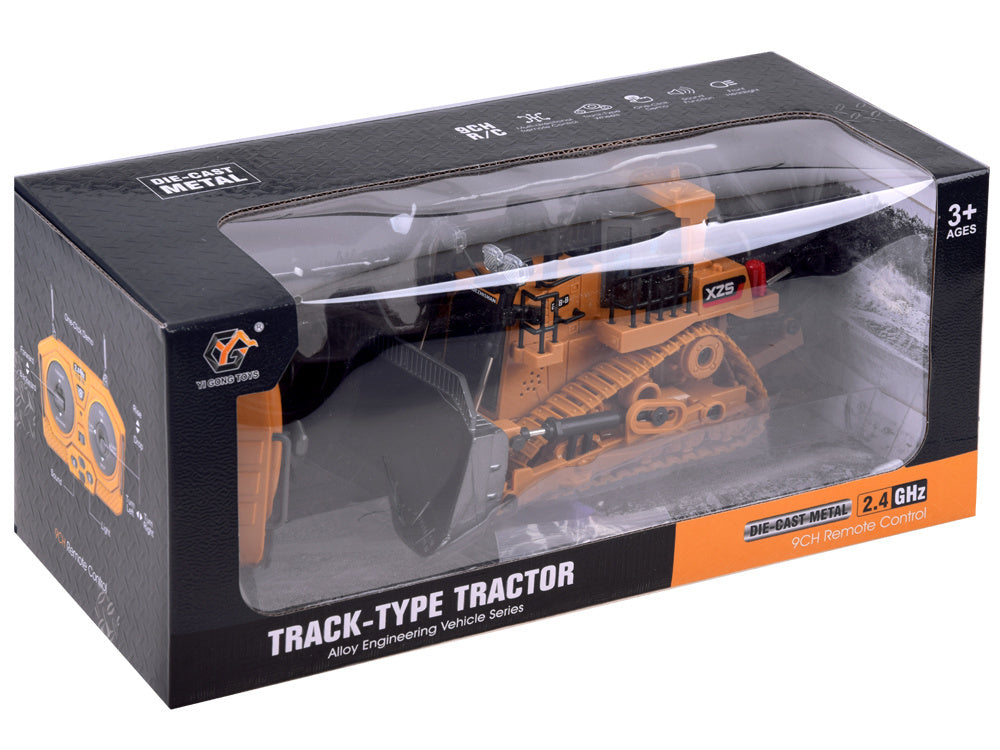 Nuotoliniu būdu valdoma buldozeris su kilnojamu kaušu