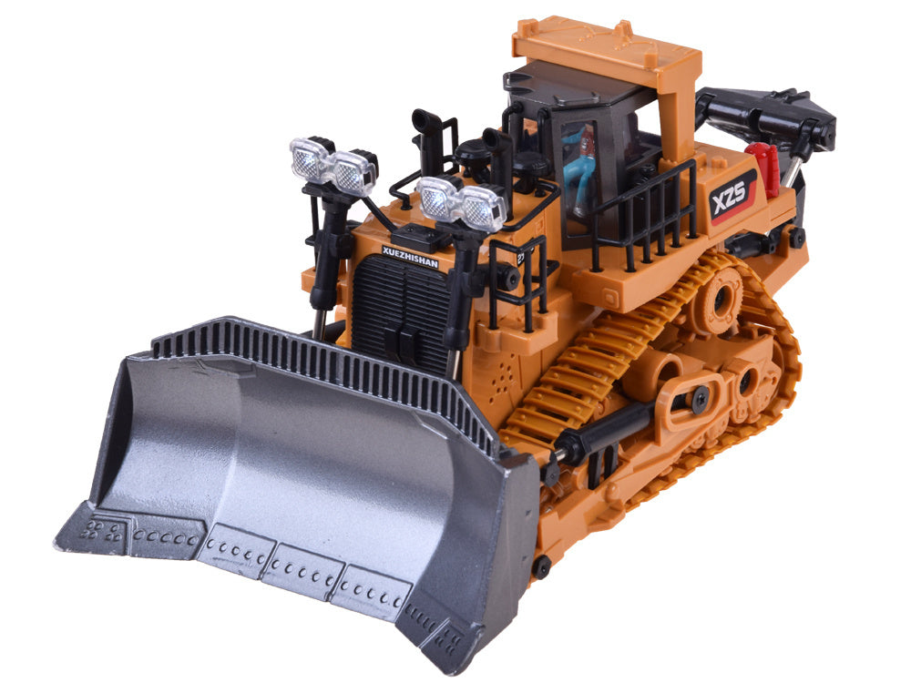 Nuotoliniu būdu valdoma buldozeris su kilnojamu kaušu