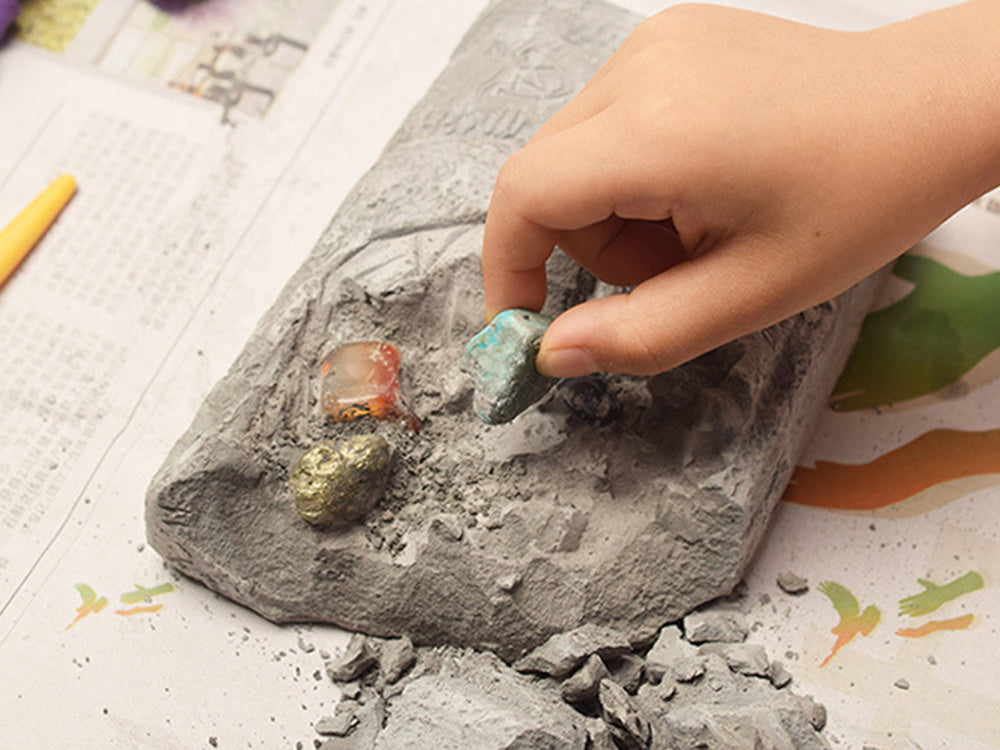 Archeologo rinkinys su brangakmeniais