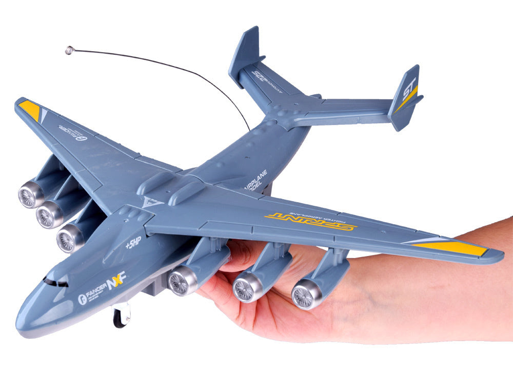 Nuotoliniu būdu valdomas lėktuvas su šviesos efektais, pilkas