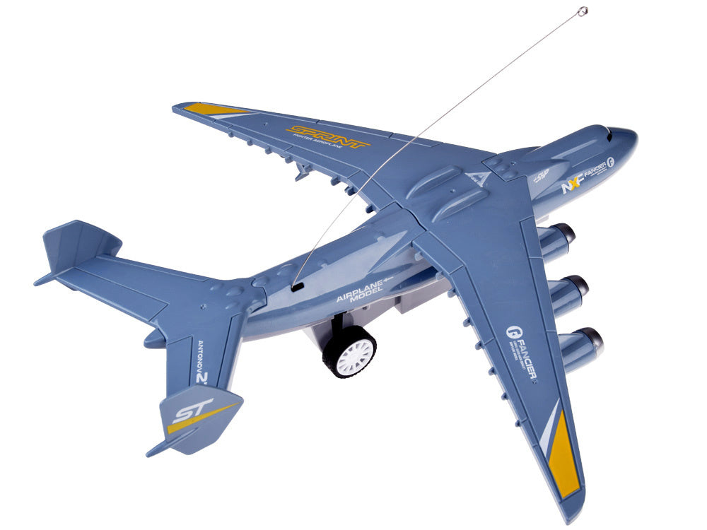 Nuotoliniu būdu valdomas lėktuvas su šviesos efektais, pilkas