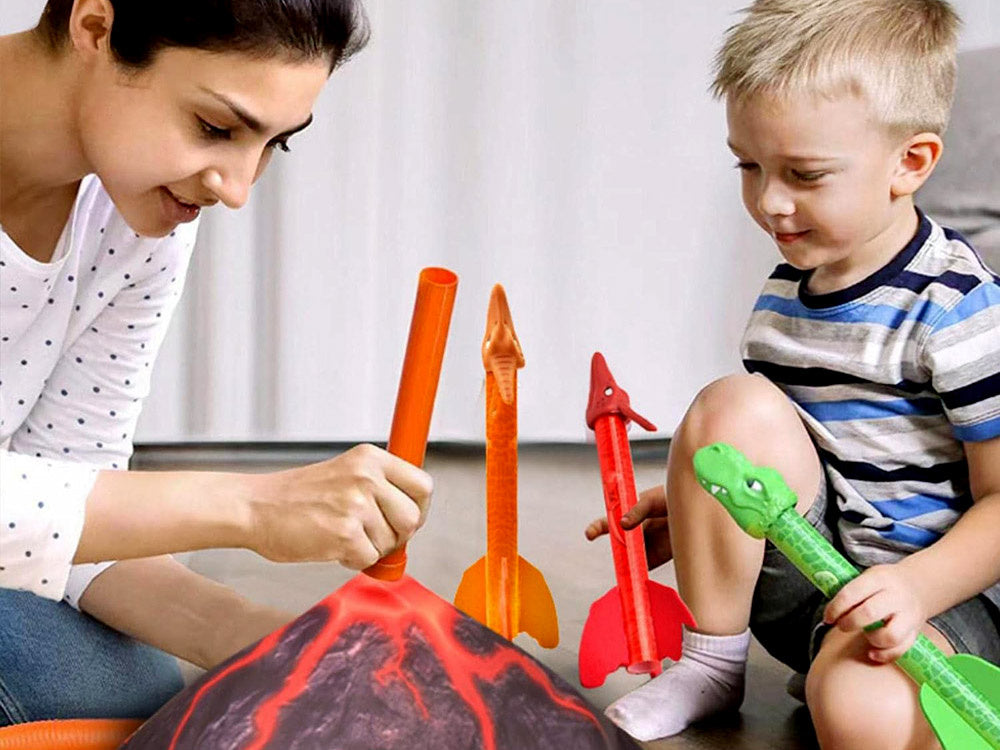 Raketų paleidimo ugnikalnis su šviesos efektais, dinozauras