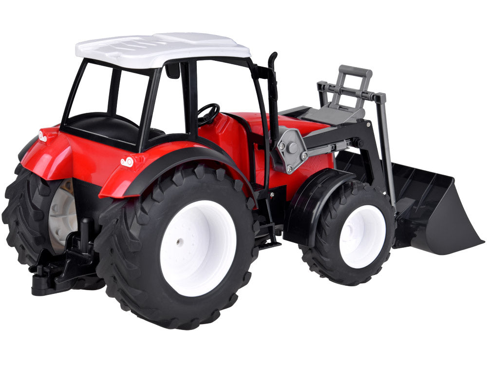 Didelis traktorius su judančia ranka ir dideliais ratais, raudonas