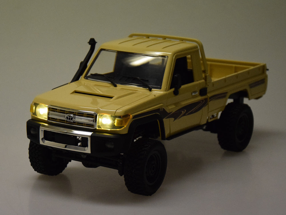 Nuotoliniu būdu valdomas Toyota Land Cruiser 4x4 Pickup automobilis, kreminis