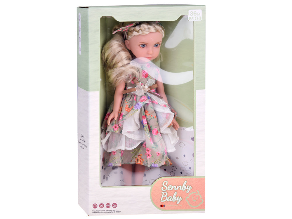 Lėlė su marga suknele