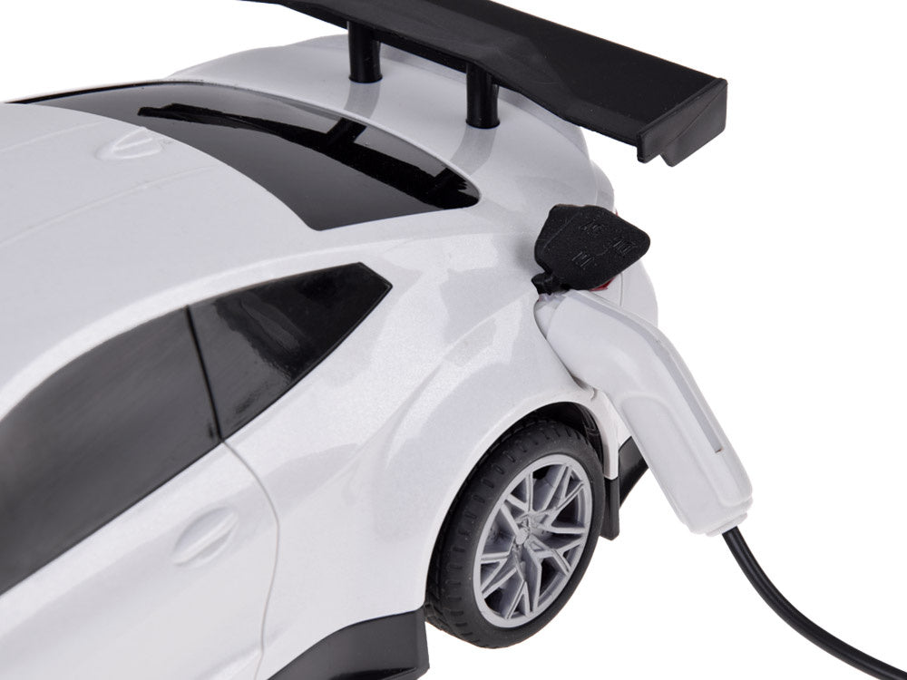 Nuotoliniu būdu valdomas lenktyninis automobilis su šviesos ir garso efektais, baltas