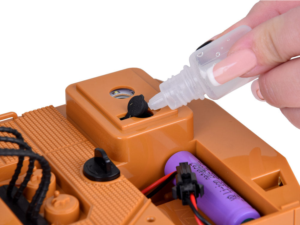 Nuotoliniu būdu valdomas vikšrinis ekskavatorius su dūmų efektu, geltonas