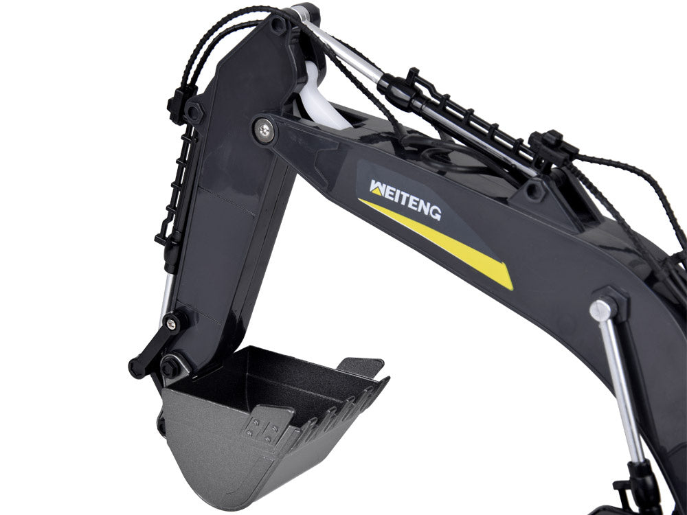 Nuotoliniu būdu valdomas vikšrinis ekskavatorius su dūmų efektu