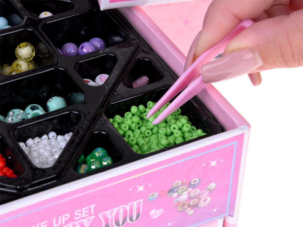 Sulankstoma papuošalų dėžutė su karoliukais ir plaukų aksesuarais