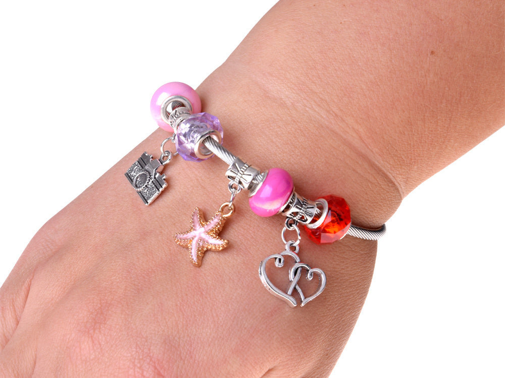 Sulankstoma papuošalų dėžutė su karoliukais ir plaukų aksesuarais