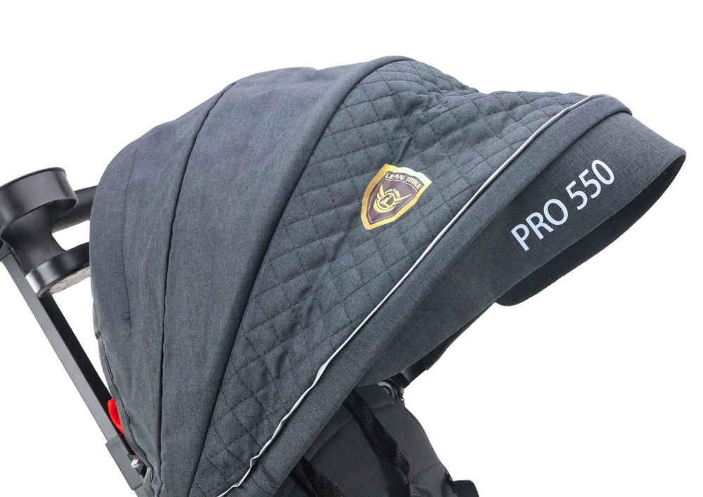 Vaikiškas triratukas PRO550 su stogeliu ir pasukama sėdyne, juodas