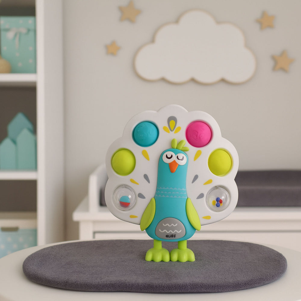 Jutiminis  žaislas povas su besisukančiais kamuoliukais ir garsais