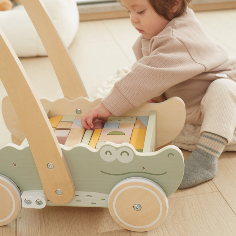 Medinis stumiamas vėžimėlis su statybiniais blokais, Viga