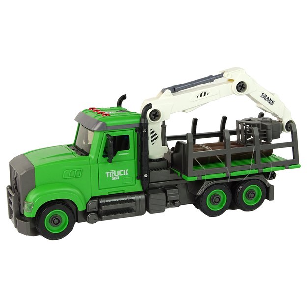 Sunkvežimis su mediena ir priedais, žalias
