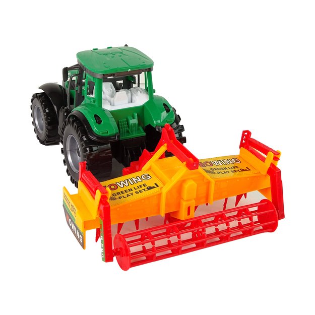 Traktorius su oranžiniu kultivatoriumi