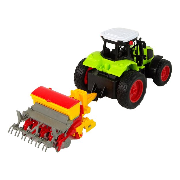 Nuotoliniu būdu valdomas traktorius su presu, žalias