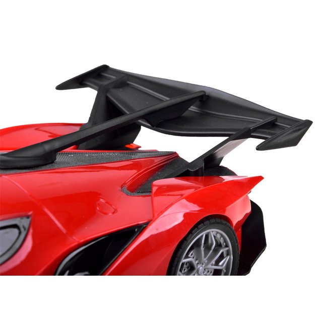 Nuotoliniu būdu valdomas sportinis automobilis su priedais, raudonas